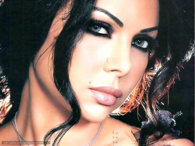woman with dark hair and makeup