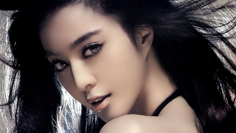 woman with dark hair and makeup