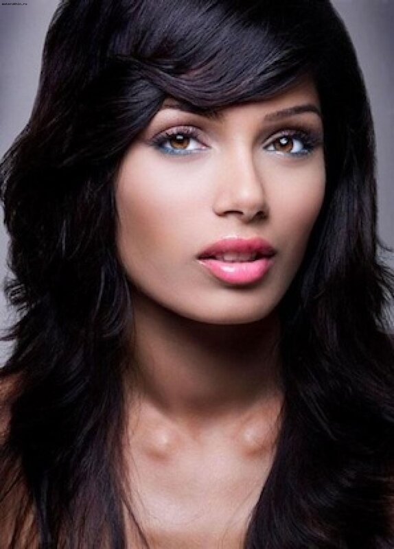 woman with dark hair and makeup