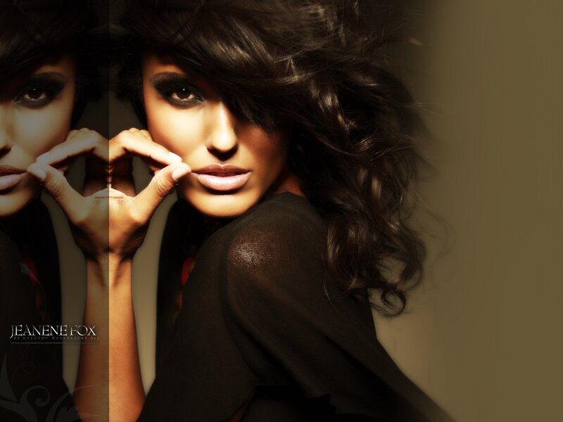 woman with dark hair and makeup