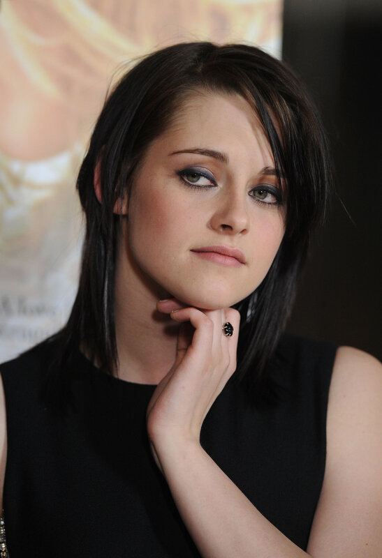 woman with dark hair and makeup