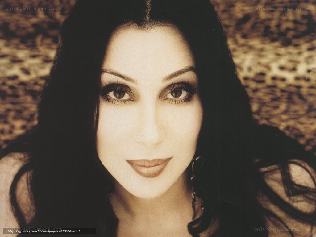 woman with dark hair and makeup