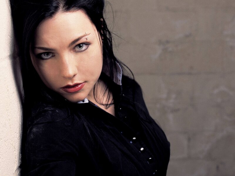 woman with dark hair and piercing