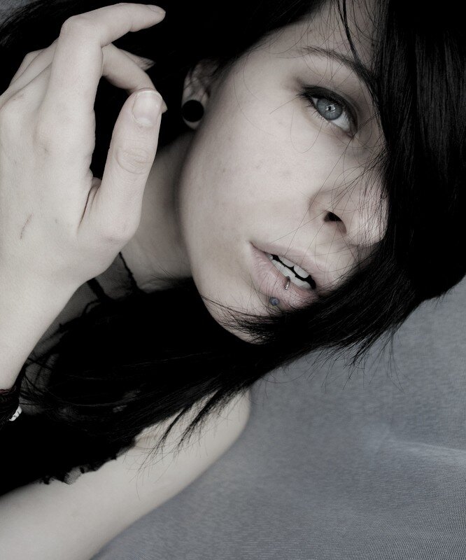 woman with dark hair and piercings
