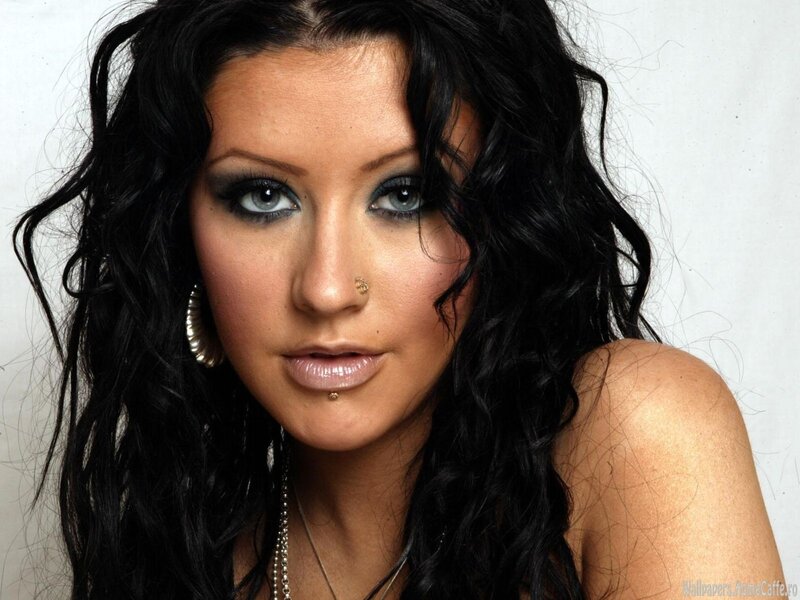 woman with dark hair and piercings
