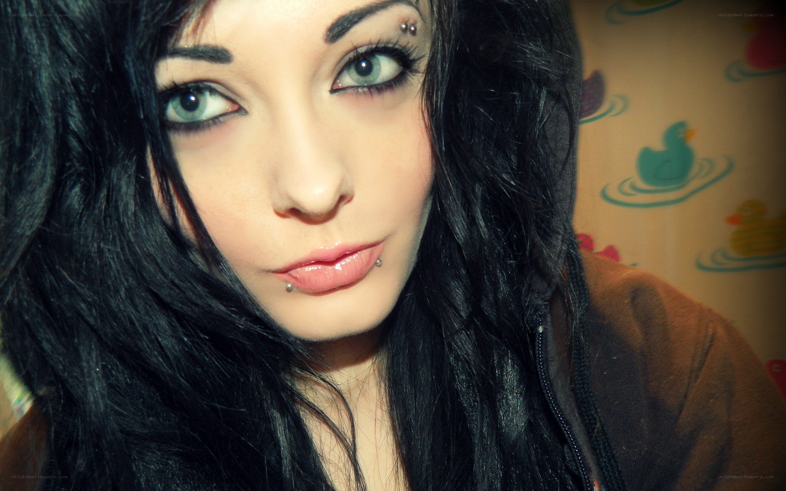 woman with dark hair and piercings