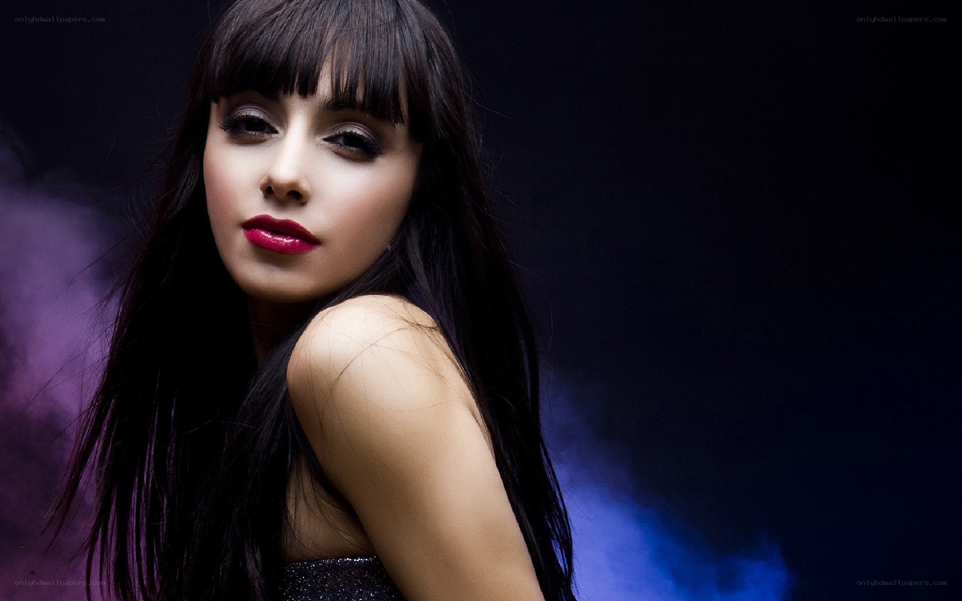 woman with dark hair and red lips