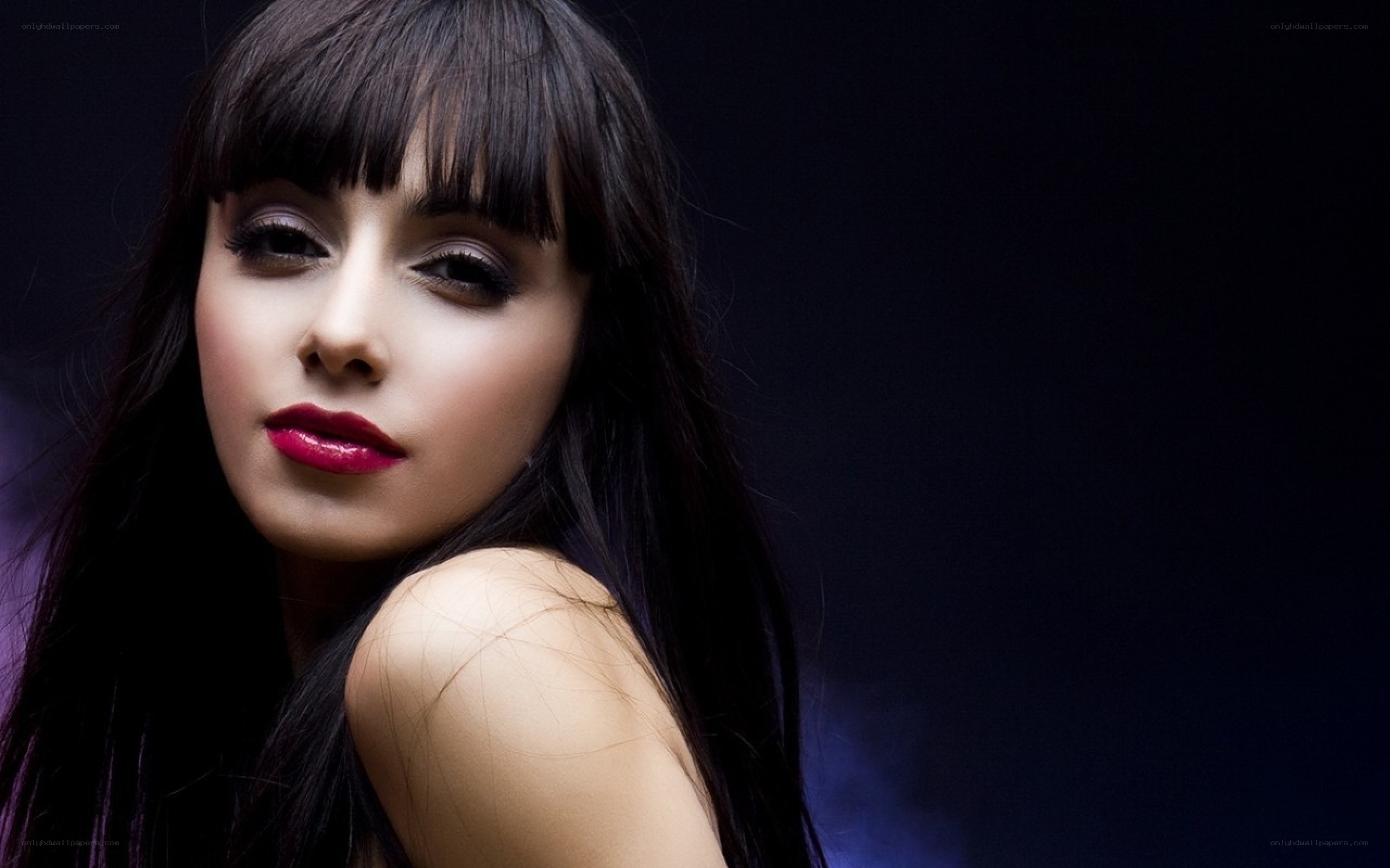 woman with dark hair and red lips