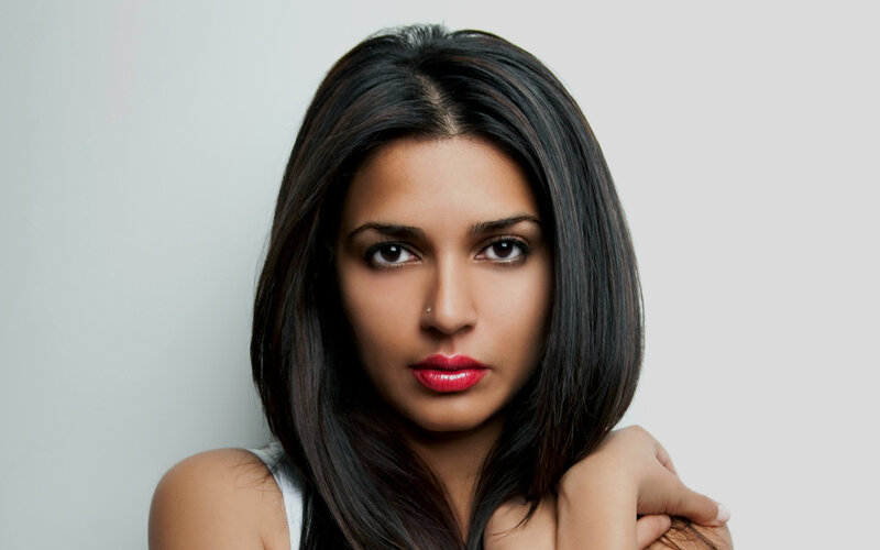 woman with dark hair and red lips