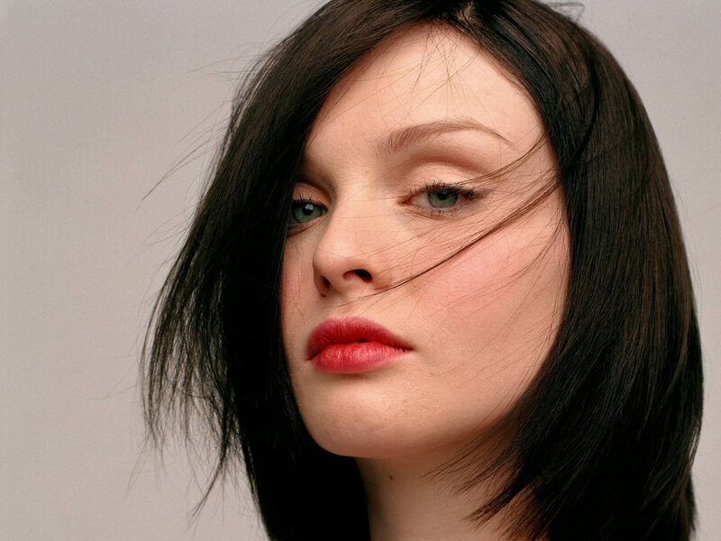 woman with dark hair and red lips