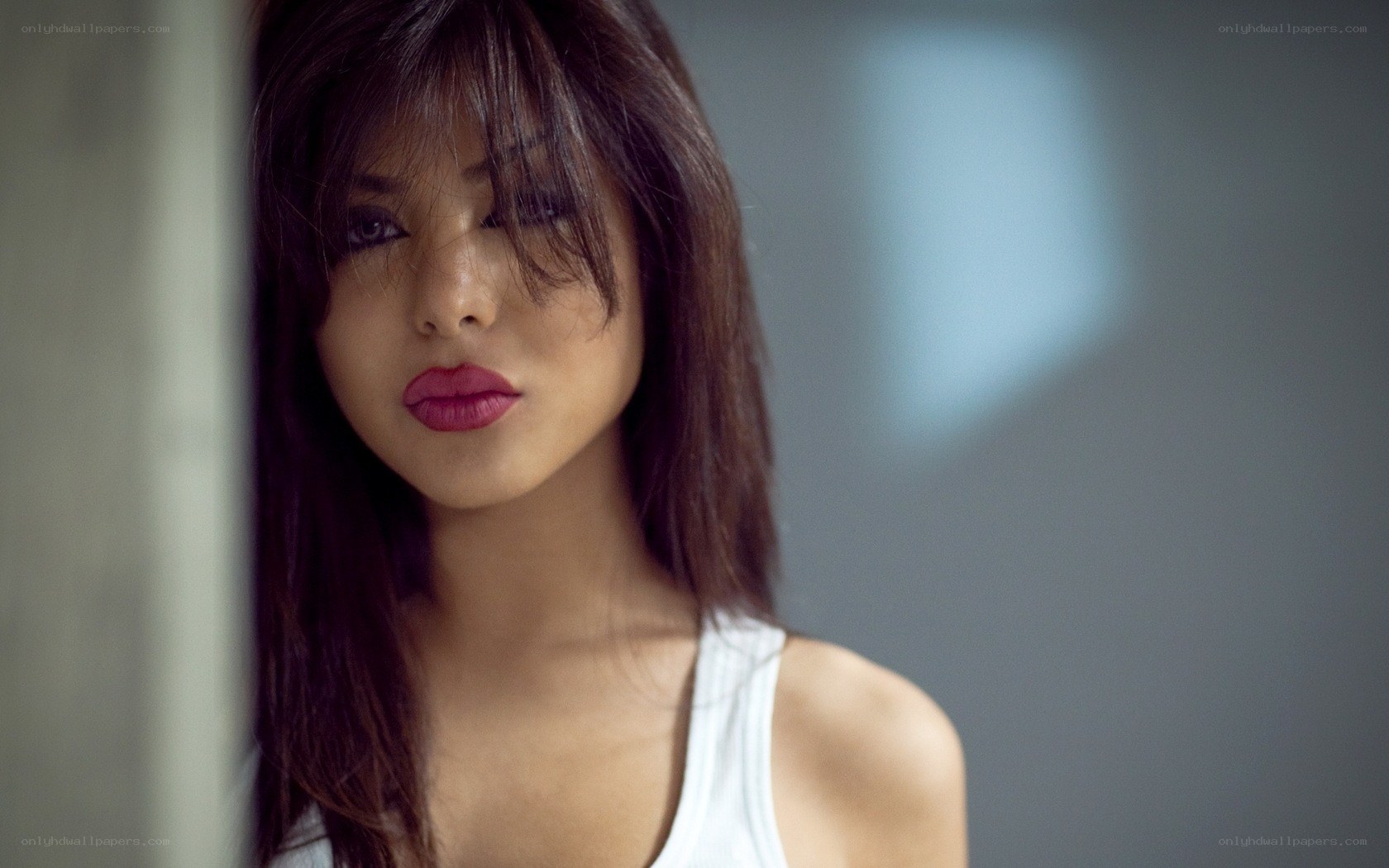 woman with dark hair and red lips