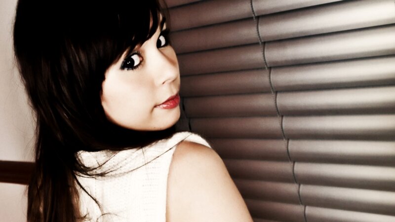 woman with dark hair and red lipstick