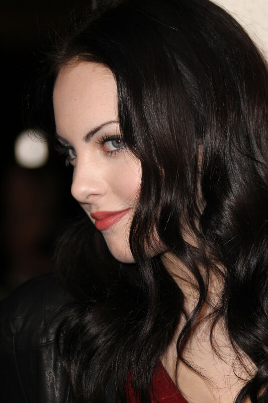 woman with dark hair and red lipstick