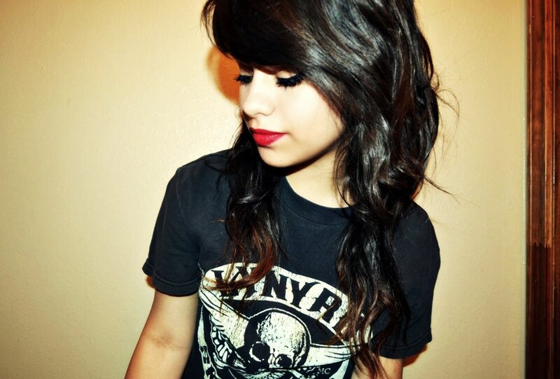 woman with dark hair and red lipstick
