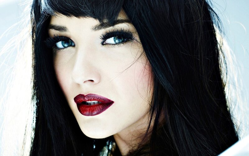 woman with dark hair and red lipstick
