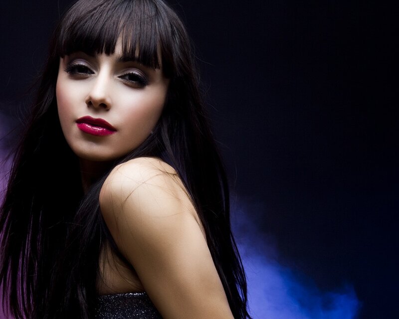 woman with dark hair and red lipstick