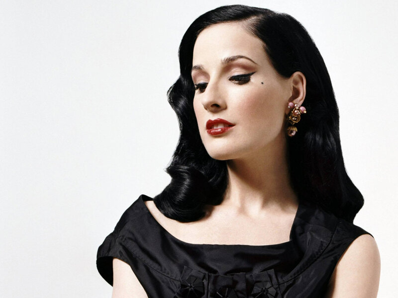 woman with dark hair and red lipstick