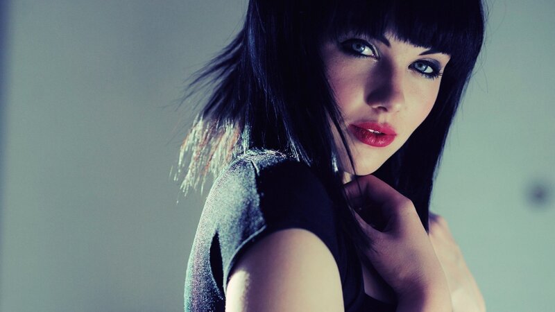 woman with dark hair and red lipstick