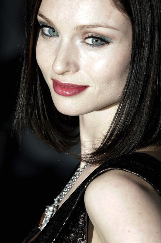 woman with dark hair and red lipstick