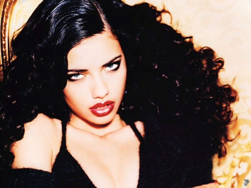 woman with dark hair and red lipstick