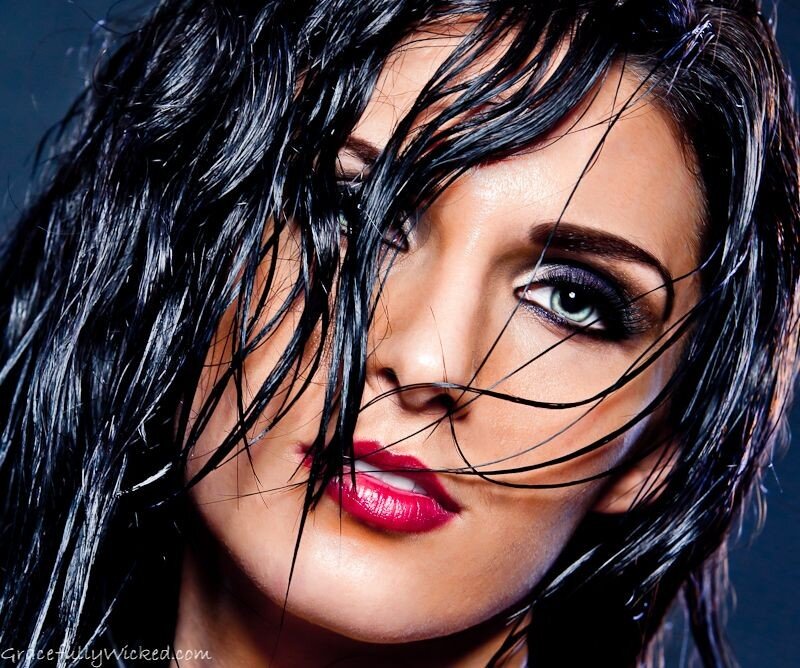 woman with dark hair and red lipstick
