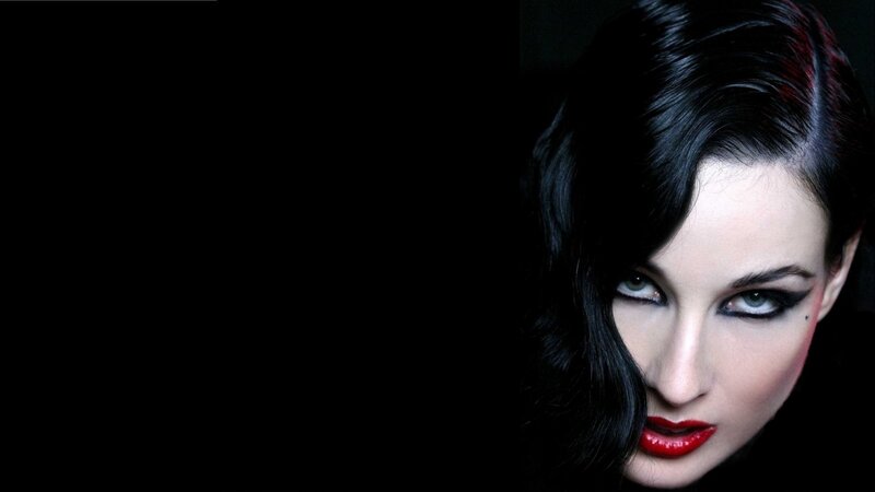 woman with dark hair and red lipstick
