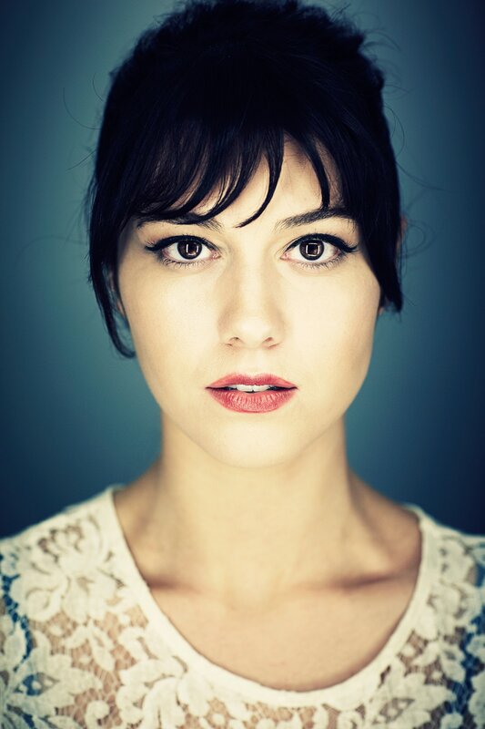 woman with dark hair and red lipstick