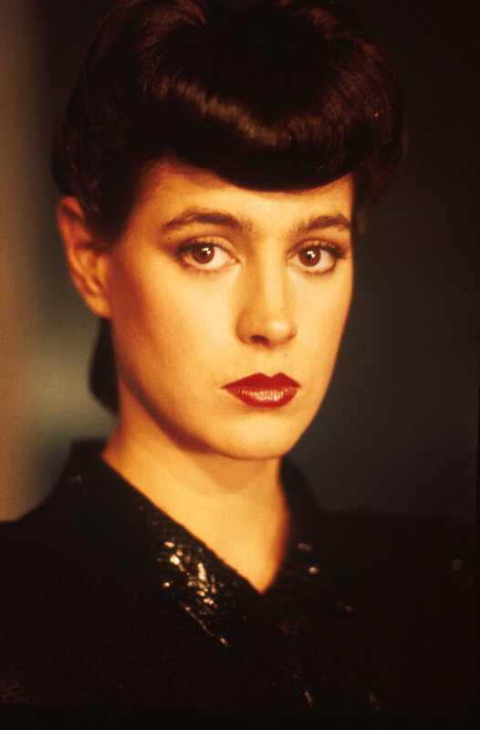 woman with dark hair and red lipstick