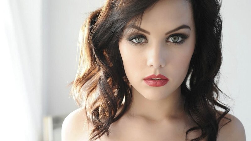 woman with dark hair and red lipstick