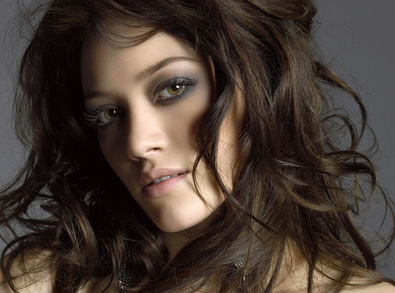 woman with dark hair and smoky eyes