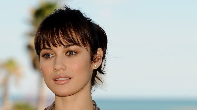woman with dark hair at beach