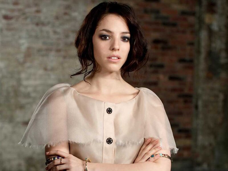 Woman with Dark Hair — Beige, Serious, Photograph