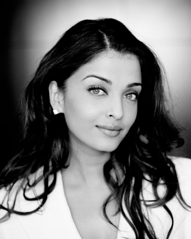 Woman with Dark Hair — Black, Calm, Photograph, Earring, Smile, White