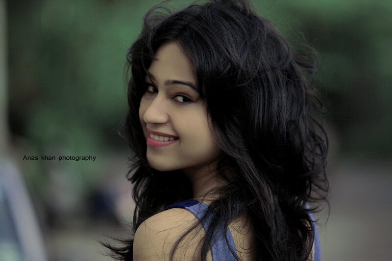 Woman with Dark Hair — Black, Calm, Photograph, Smile, Blue Top