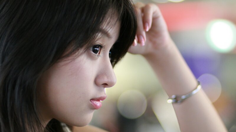 Woman with Dark Hair — Black, Contemplative, Night