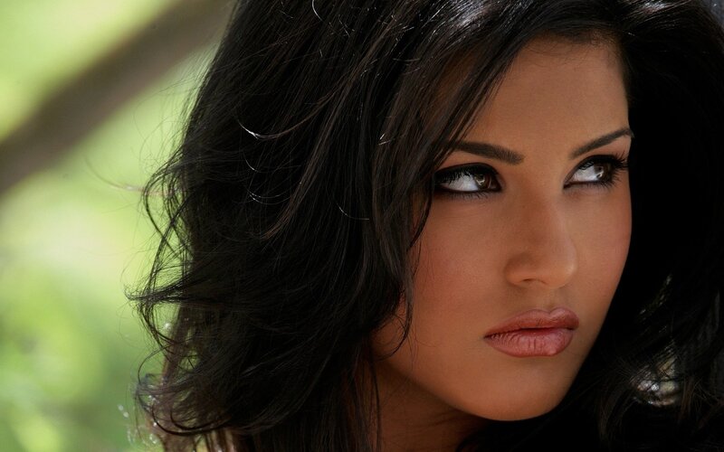Woman with Dark Hair — Black, Contemplative, Photograph, Eyes, Outdoor