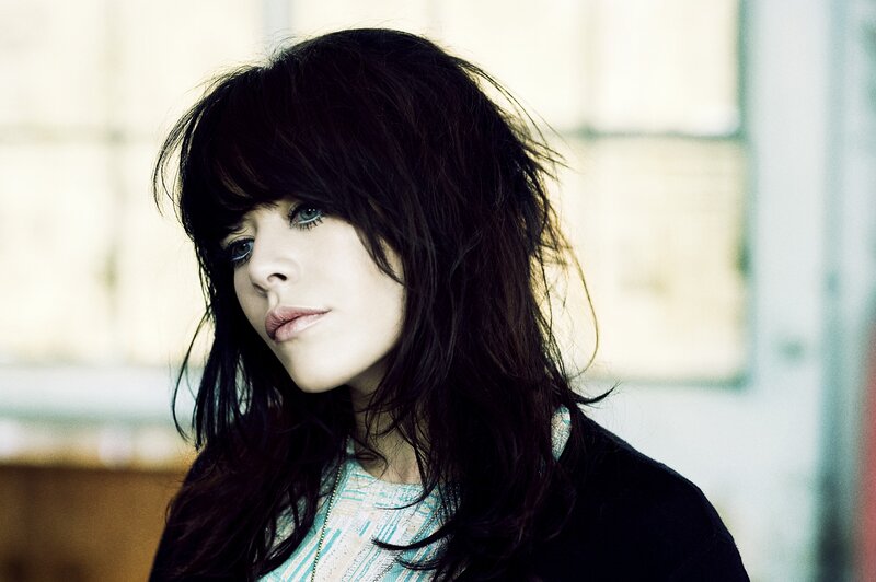 Woman with Dark Hair — Black, Contemplative, Photograph, Person
