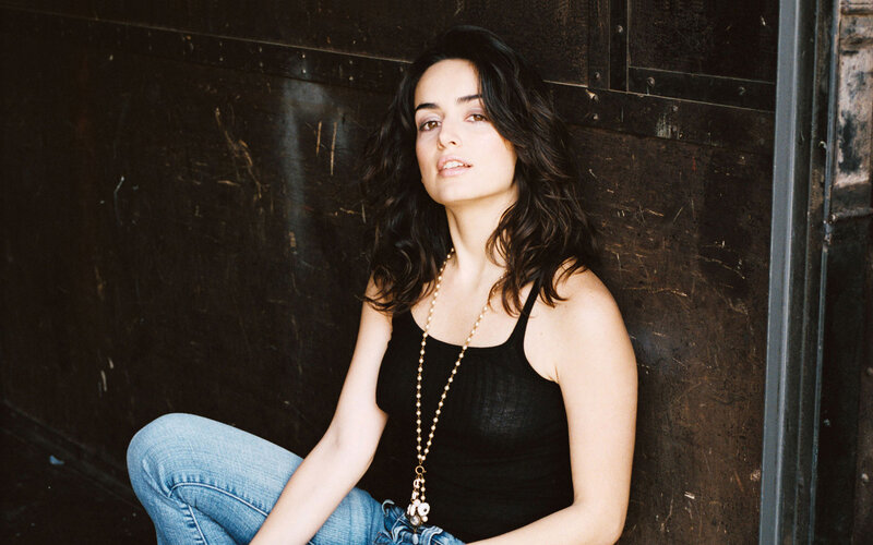 Woman with Dark Hair — Black, Contemplative