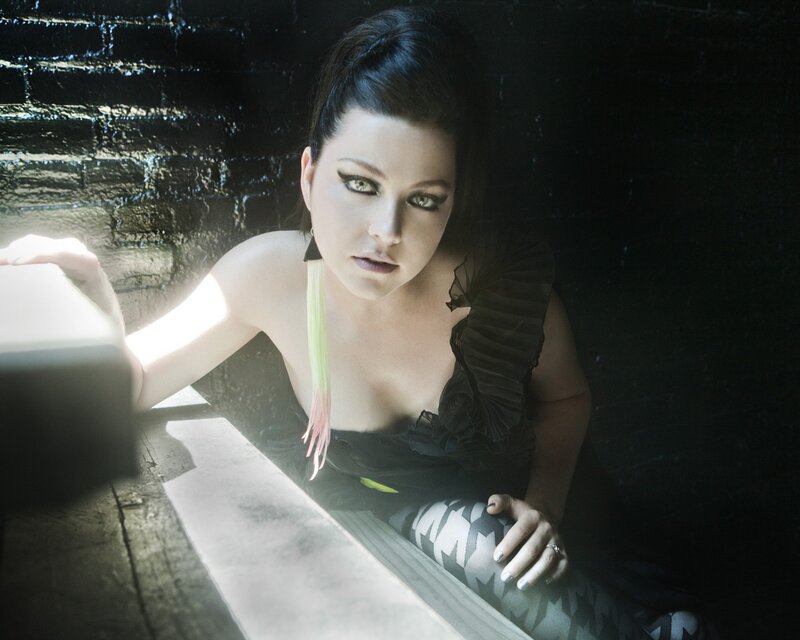 Woman with Dark Hair — Black, Dramatic, Photograph, Brick Wall