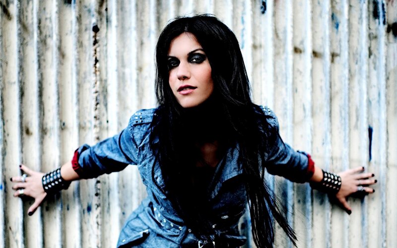 Woman with Dark Hair — Black, Dramatic, Photograph, Corrugated Wall