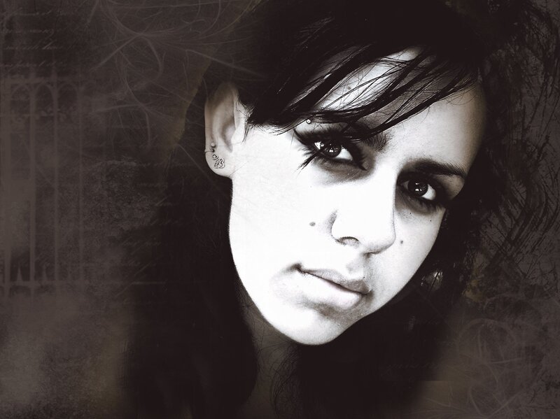Woman with Dark Hair — Black, Dramatic, Photograph, Earring, Eyebrow Piercing