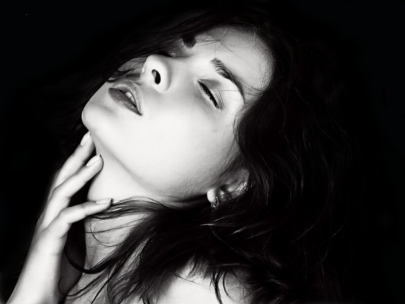 Woman with Dark Hair — Black, Dramatic, Photograph, Hand, Earring, White