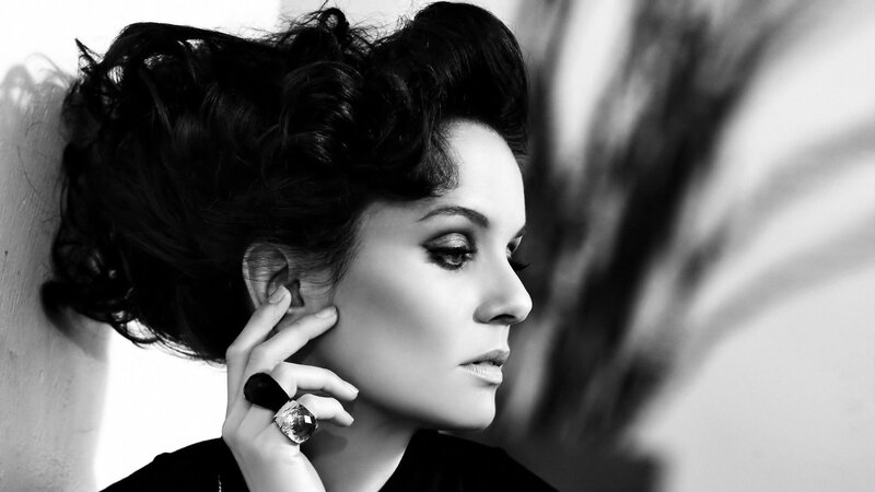 Woman with Dark Hair — Black, Dramatic, Photograph, Hand, Ring, Wall