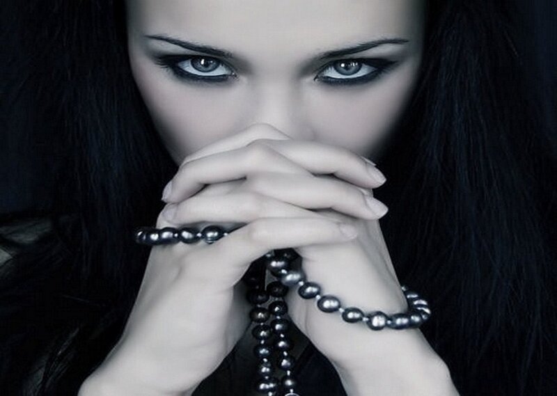 Woman with Dark Hair — Black, Dramatic, Photograph, Hands, Beads