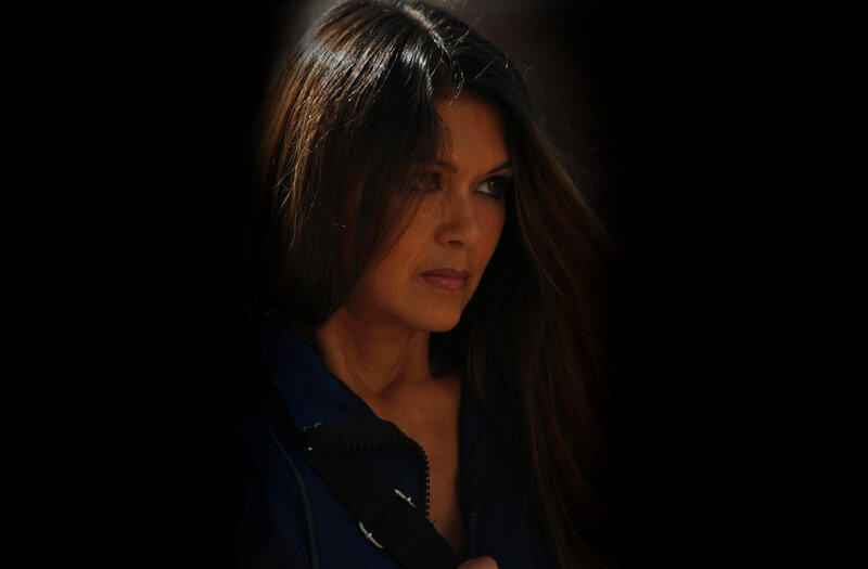 Woman with Dark Hair — Black, Dramatic, Photograph, Jacket, Strap