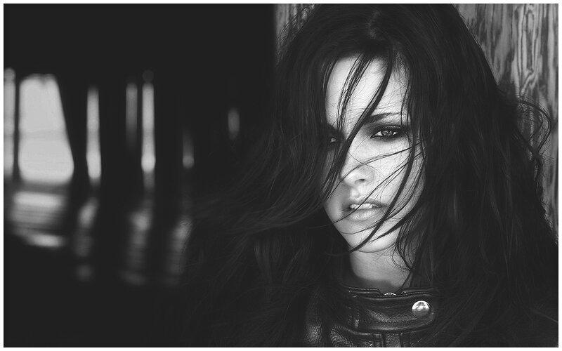 Woman with Dark Hair — Black, Dramatic, Photograph, Leather Jacket