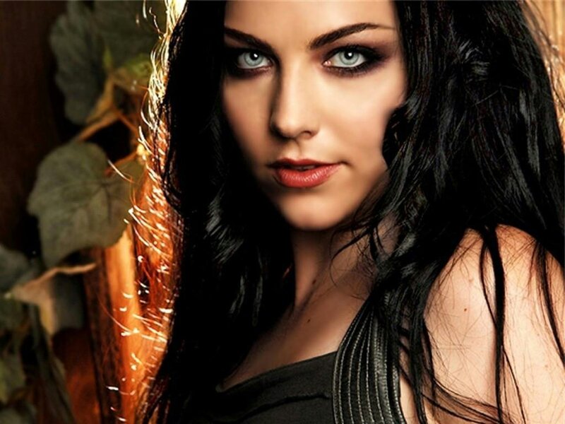 Woman with Dark Hair — Black, Dramatic, Photograph, Leaves