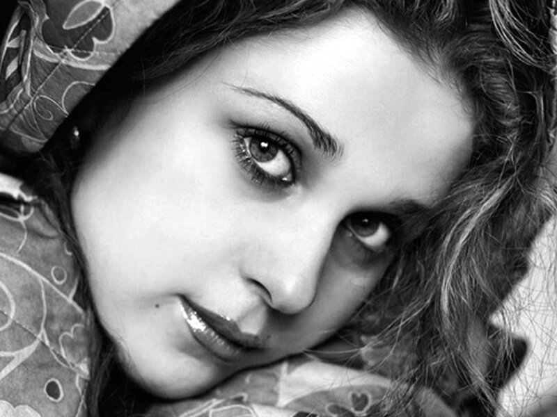 Woman with Dark Hair — Black, Intense, Photograph, Eyes, Patterned Fabric