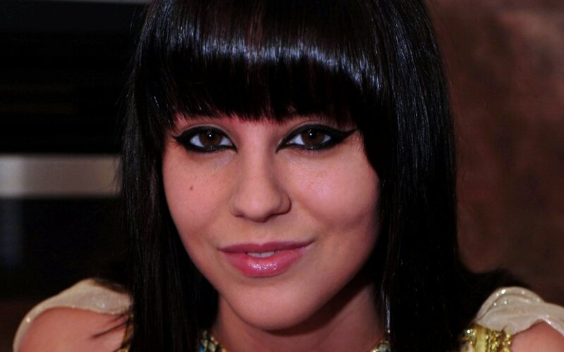 Woman with Dark Hair — Black, Neutral, Photograph, Bangs, Eyeliner