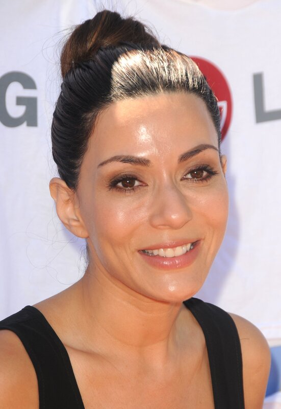 Woman with Dark Hair — Black, Neutral, Photograph, Black Top, Hair Bun